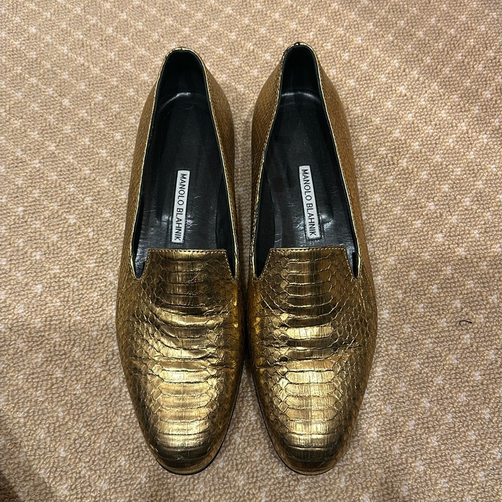 Manolo Blahnik gold snakeskin loafers. A classic staple in your wardrobe.